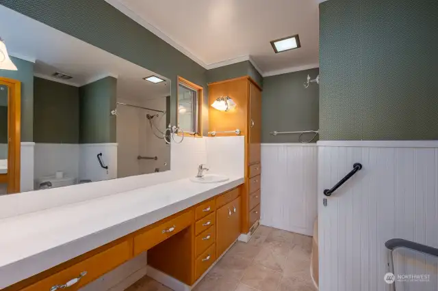 The primary bedroom features lots of countertop space.