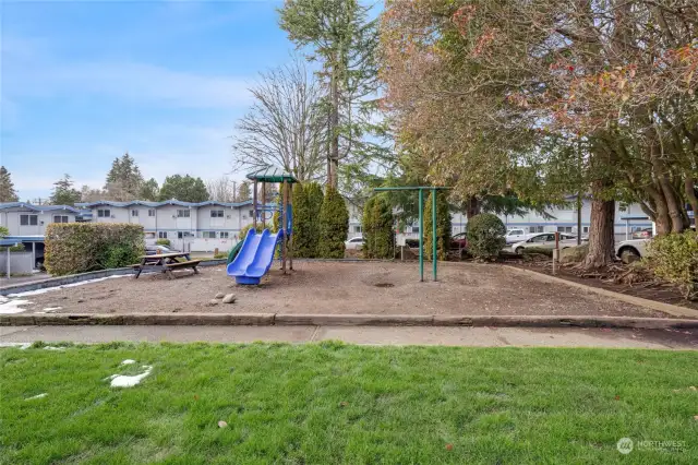 Playground and common area is in the middle of the townhouses.