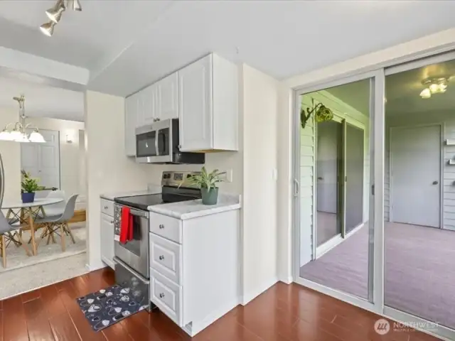 Two sliding doors to deck with storage. Also installed new carpeting on deck.