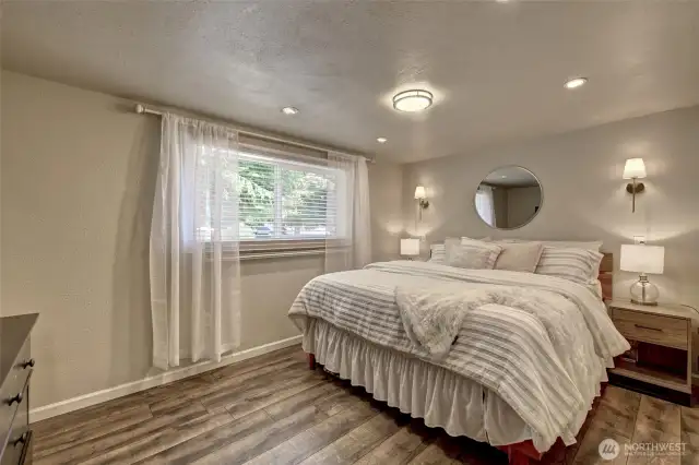 Bright and cozy primary bedroom.