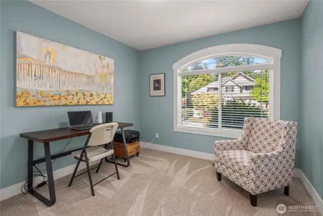 Bedroom no. 2 staged as a office - large window funnels in tons of natural light!
