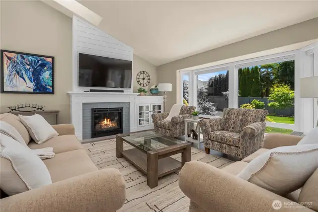 Large windows soak the home in natural light - along with skylights!