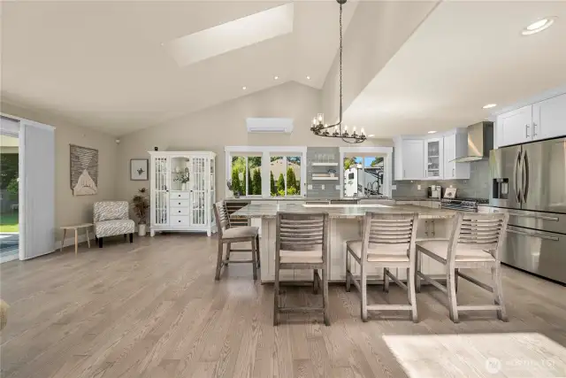 Seamless open-concept living connecting the kitchen, dining, and great room
