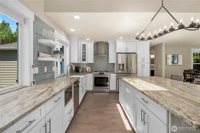 The chef’s kitchen is a showstopper with all-new cabinetry and sleek countertops