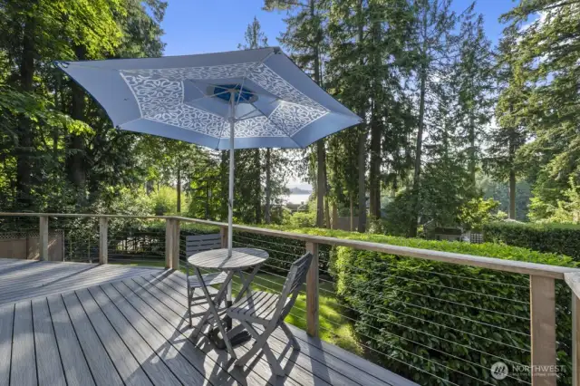 Wraparound outdoor space offering peekaboo water views and relaxation zones