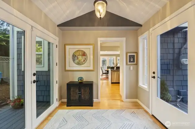 Clean lines, vaulted height, and warm, welcoming finishes