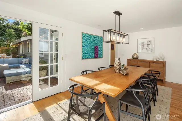 Entertain to your heart's content in this gorgeous dining room. french doors open to a stunning brick patio.