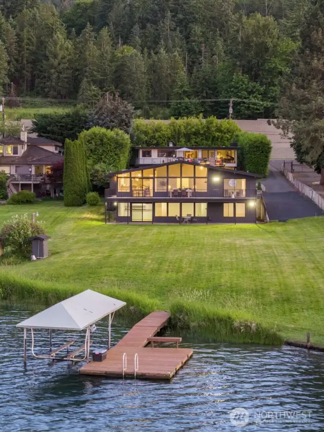 House, yard and dock as seen from Lk Sammamish