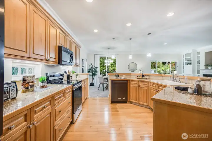 The home chef stays connected with visiting guests and friends, thanks to this open kitchen design.