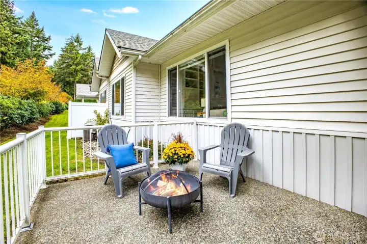 An extension of the home’s living space, this patio offers ample space for outdoor furniture, potted plants, an herb garden, or a small firepit.