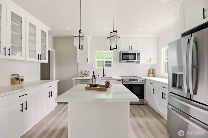 Amazing kitchen island provides extra prep space or use it to serve meals. Can also serve as an eating space with stools.