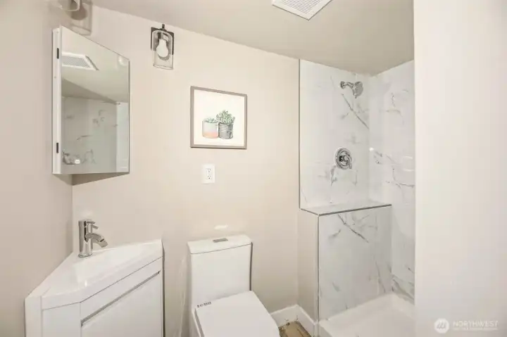 Three quarter bathroom is basement is perfect for whatever you decide to use the basement for.
