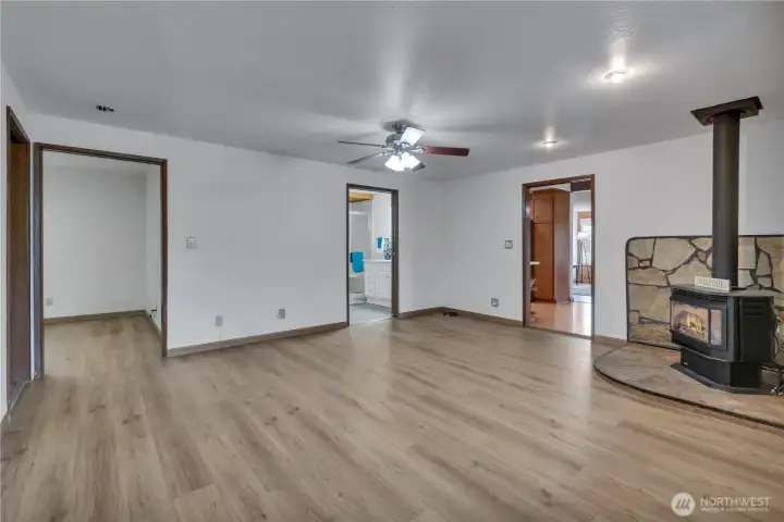 view from family room with access to large extra finished room/ bedroom/ laundry room & 3/4 bathroom.