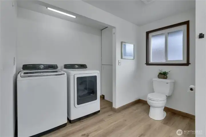 Laundry room with 3/4 bathroom