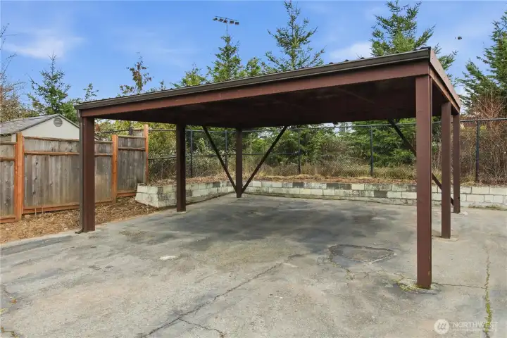 Substantial oversized carport.