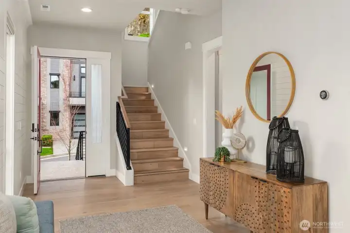 Entry Area & Extended Hardwoods on Stairs