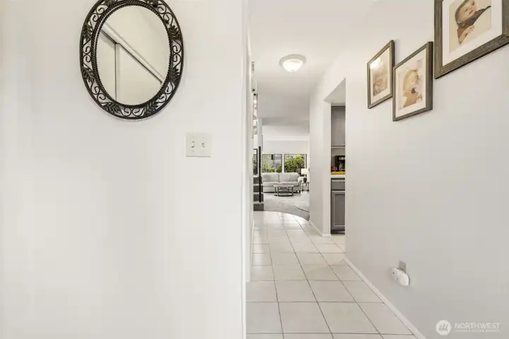 Bright foyer and view of hallway.
