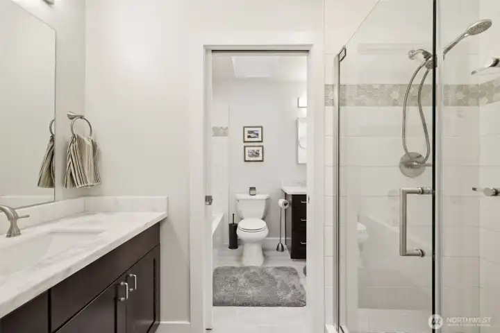 Check out these fine fixtures in updated 5 piece bathroom.