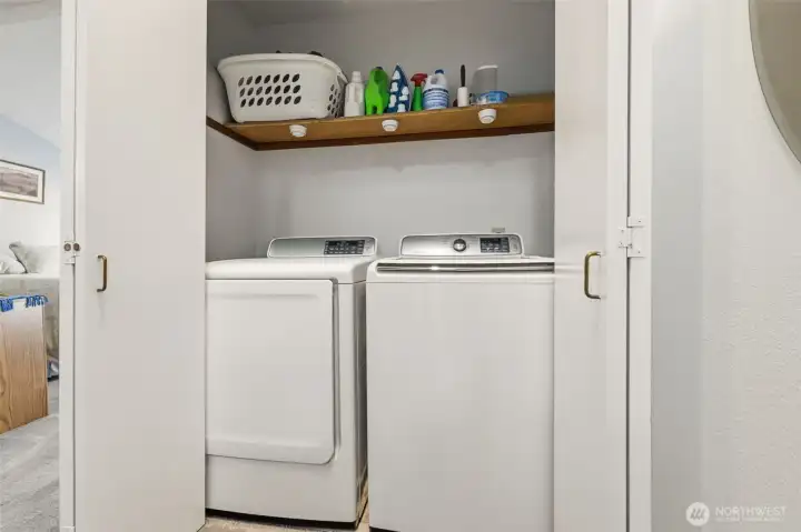 Upstairs full sized laundry closet.