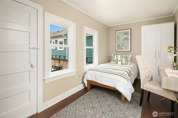 3rd bedroom with separate door to patio, flexible space for home office etc.