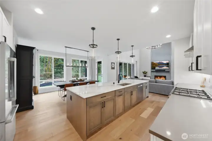 Chef's kitchen with clean lines and high end finishes.