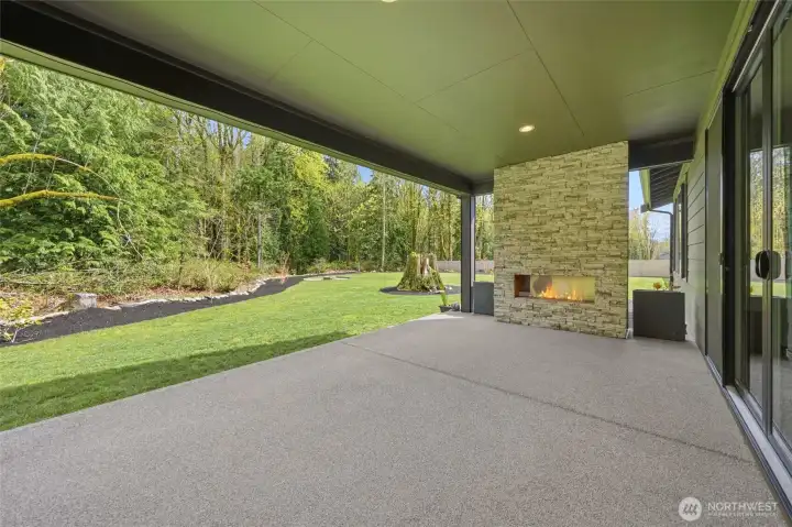 Covered Outdoor lounge space with Gas fireplace