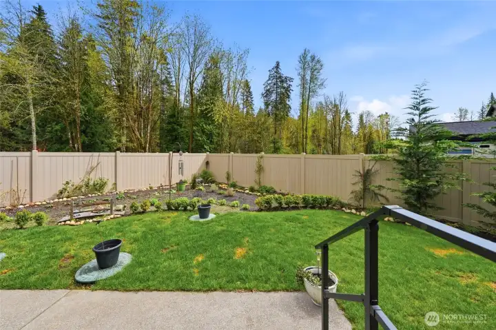 Guest House fenced backyard and patio
