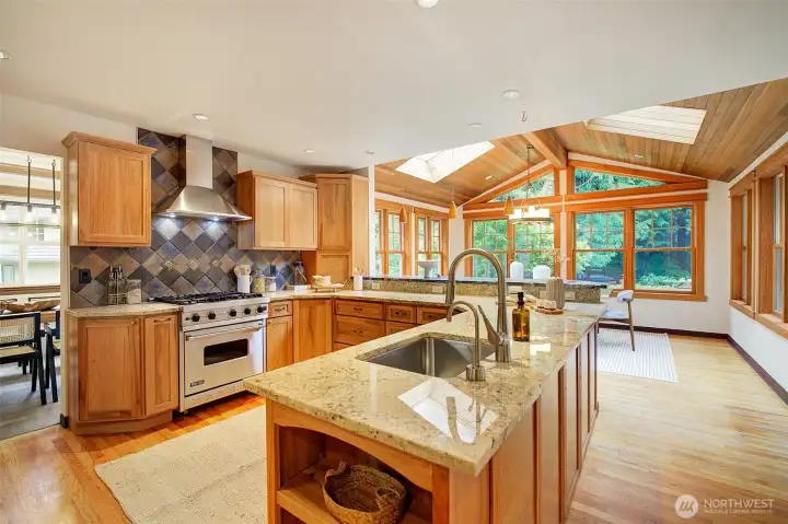 Entry leads you to a stunning Great Room with kitchen, living room and dining room clustered together for open living