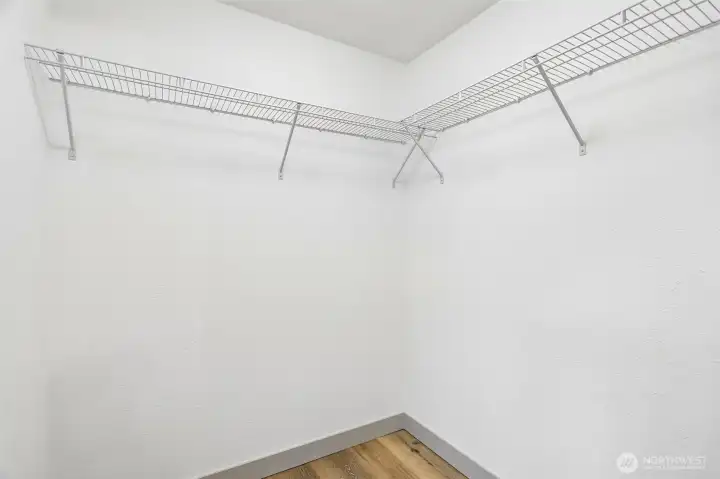 Primary bedroom walk-in closet