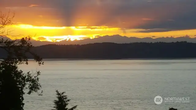 The majestic Olympics and Islands in beautiful Puget Sound Sunsets. Priceless!