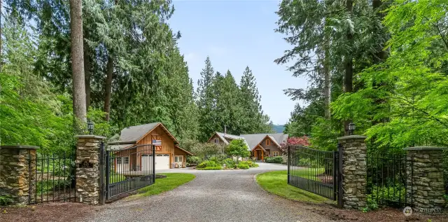 Front driveway gated entrance - Traditional architectural design, English cottage stone & timber.