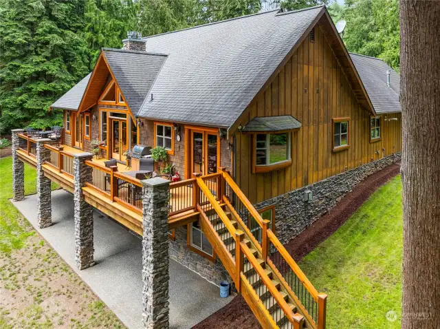 Traditional architectural design, English cottage stone & timber. - Looking at the side view of home.