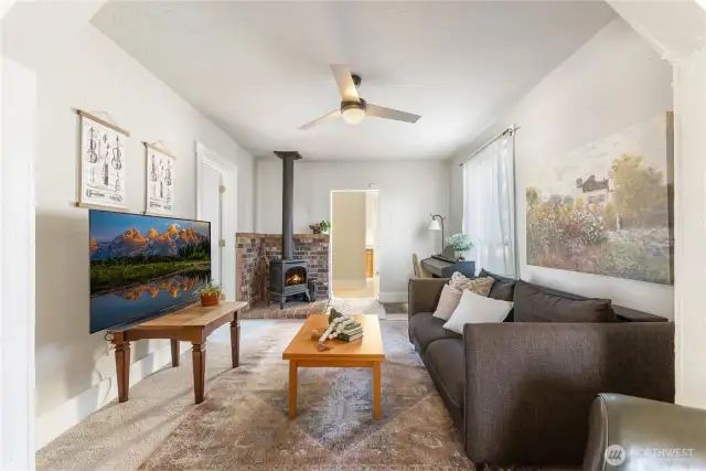 Walk through the archway and you have a cozy living room with a propane fireplace.