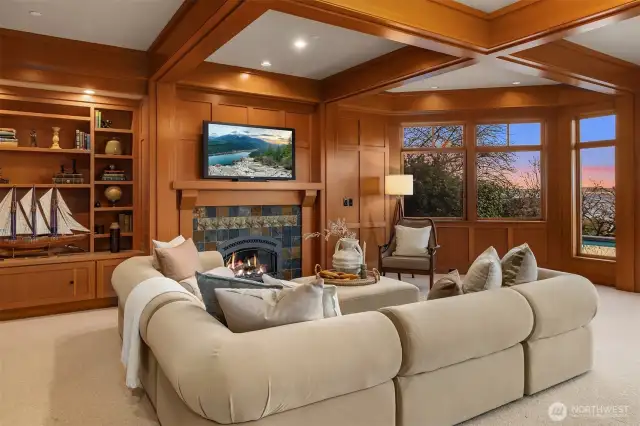 Rich wood detailing & gas fireplace make this space inviting & cozy to relax and entertain.