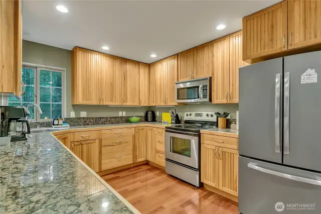 So much storage!! Now you can really see the custom hickory cabinets---stunning!