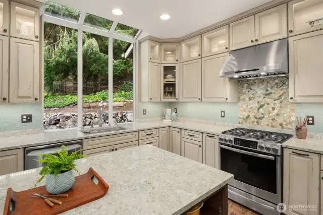 Large windows to the private backyard views.