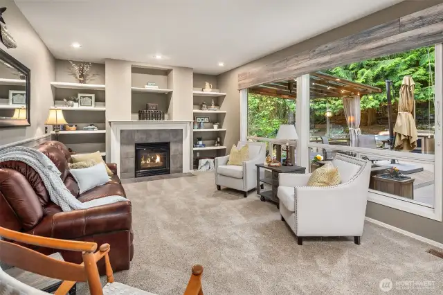 Huge view windows line the family room