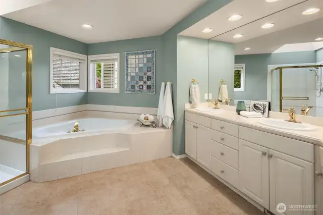 Five piece primary bath with water closet, and walk in closet.