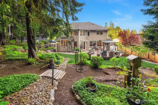 Amazing back garden area with lovely landscaping.  This lot is over 14,000 sf