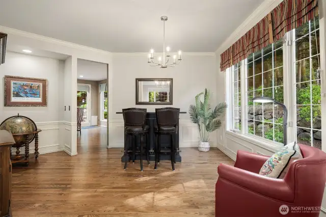 Fun use of the full size dining room. Notice the beautiful white oak hardwood floors.