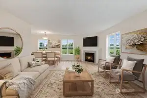 Virtually staged living room & dining room areas.