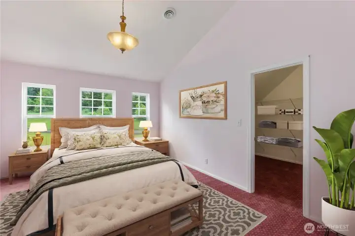 Virtually staged primary bedroom on main floor.  Primary bath is to the left.