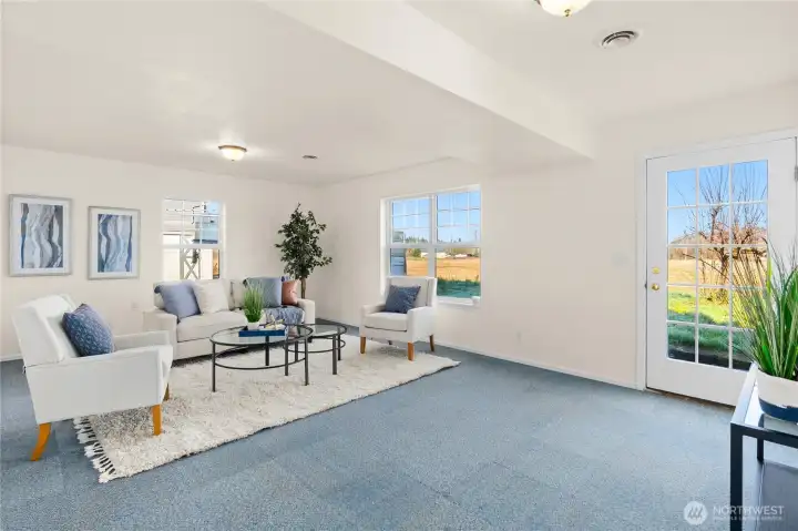 Lower level bonus space is bright and welcoming. It is plumbed for gas, which there may be future ADU possibilities.