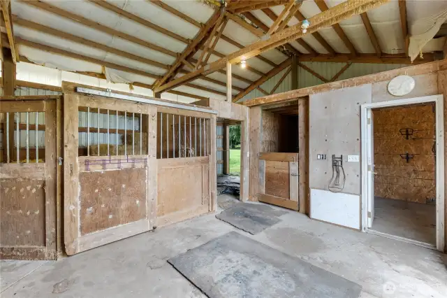 Interior of 4-stall barn and tack room.