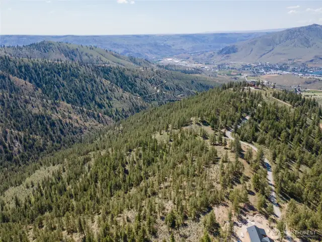 Exterior aerial view of property and surrounding lots.