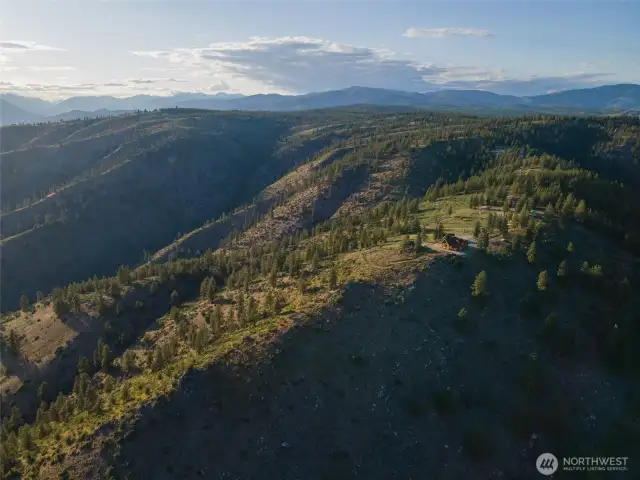 Exterior aerial view of property and surrounding lots.