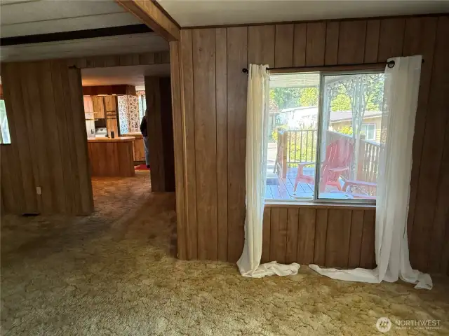 This angle from the family room faces the dining room through to the kitchen.