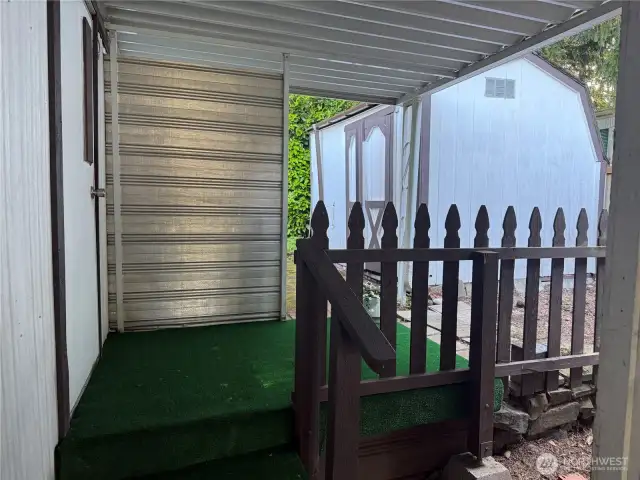 This back yard porch is at the end of the carport walkway.