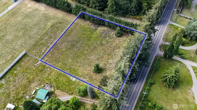 Over an acre of land, ready for your development. Blue boundary lines are approximate. Buyer to verify to their own satisfaction.