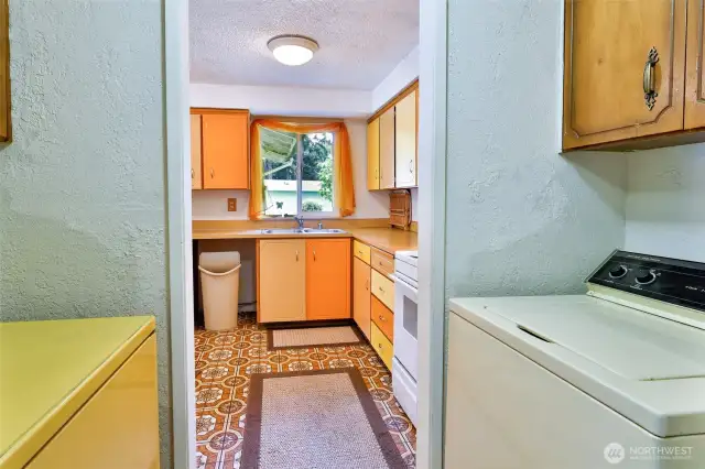 Walk-thru Laundry Rm. from the hallway into the Kitchen.